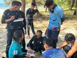 Trainees getting briefed before a dive session