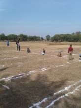 Children marking the boundary lines for Kho-Kho