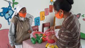 Teachers serve nutritional foods