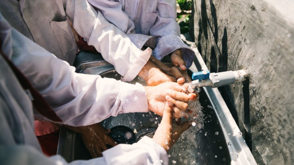 Washing hands before entering library