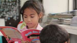 Children in rebuilt school classroom