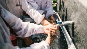 Washing hands before entering library