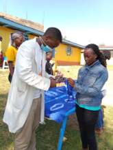 An EFC graduate in Nairobi learning tie and dye