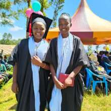 Yvonne and fellow EWI classmate at graduation