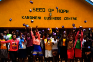 Girls receiving their period packs