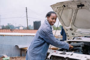 A young girl at a mechanics practical class