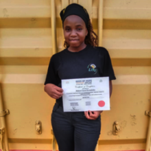 Sarah with her Entrepreneurship certificate