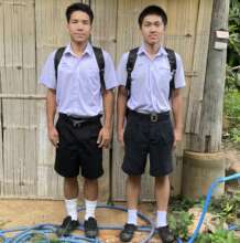 A and Thiew waiting for the school bus