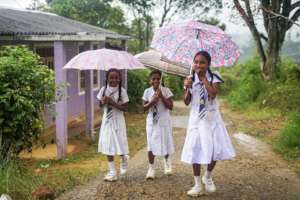 Girls arrive for class