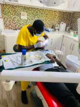 Our dentist performing procedure