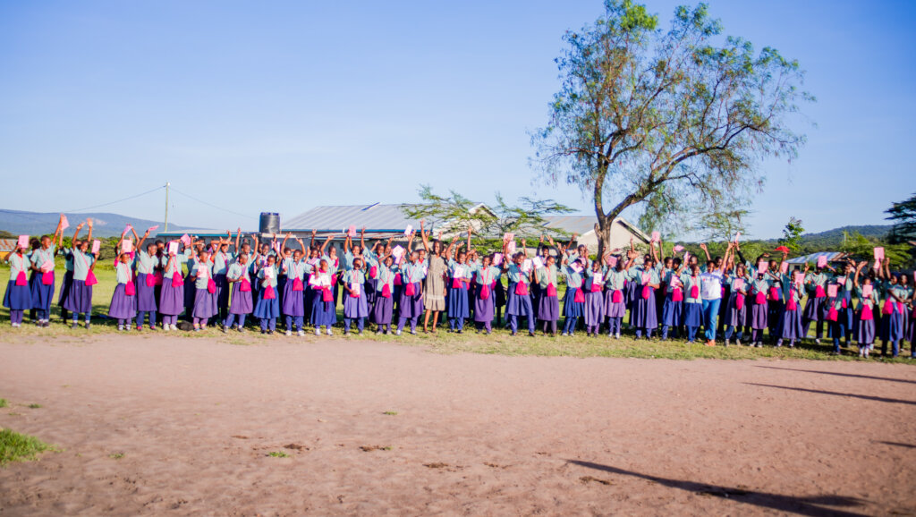 Group photo after the session with menstrual kits