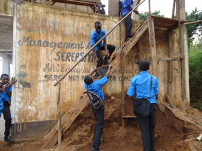 OVCs assisting in transfering sand up.