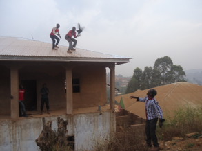 Carpenter receiving a chicking after roofing.