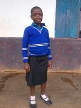 Melvis  is now very happy  attending school