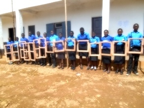 Students lined up with the sarches to be fitted.
