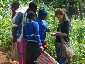 Sarah is busy controling students carrying Sand