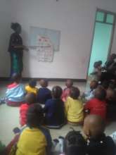 Lois teaching her students