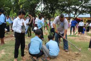 Planting trees at a primary school in Prey Veng