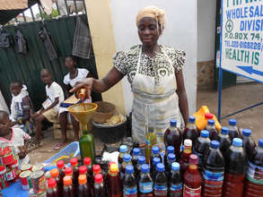 Palm oil seller Adua, new loan client in Nsawam