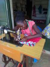 Gloria in a shop as an independent graduate
