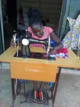 Gloria doing her practical as a graduate