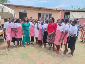 Munduru in a group photo at school