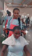 Minduru photo 1 working on her customer