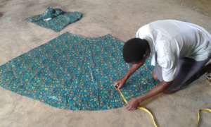 Tailoring student doing a practical