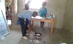 Catering tutor demonstrating to the students