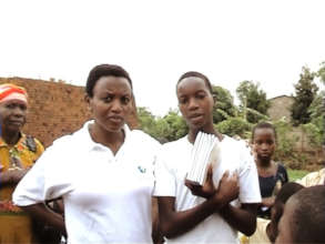 Orphan girl with our staff