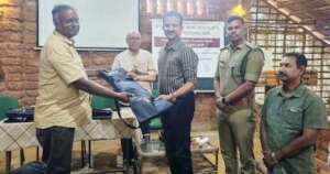 Kottayam DFO receiving snake kit from Director, TI