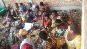 Self-help group distributing interest earned.