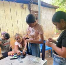 sewing class students making hair scrunchies