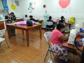 Cancer patients learning to sew