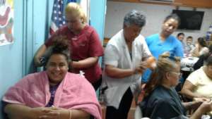 Beauty students practicing and providing services