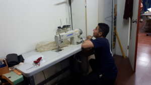 Diddman fixing sewing machines