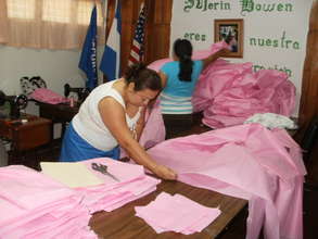 Suyen & Petronila working on hospital sheets