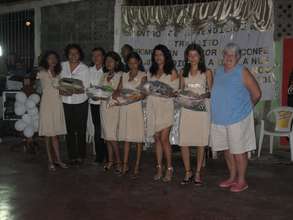 Lynda with the class graduates