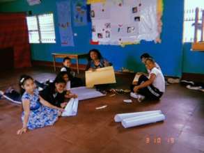 Preparing the signs for the fair and activities