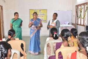 Women giving feed back about the camp