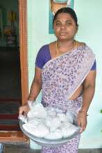 She is doing Batter preparation also