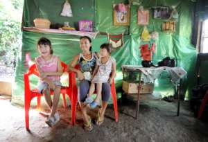 Mother with daughters at home