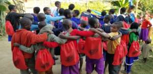 The children receive their school supplies