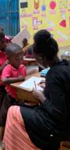 Licky Working with a Student