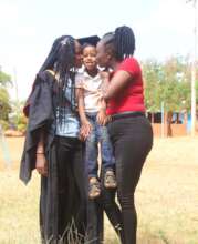 Graduate Juliet celebrates with sister and son