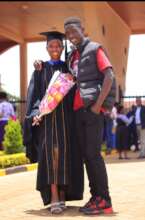 Shaden at her graduation, with her brother Muugi