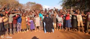 Shaden celebrates with Makindu staff and children