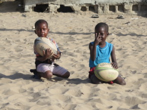 Girls learning about the game