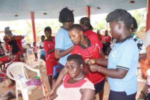 students plaiting hair