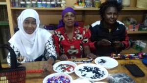 women in beading lab